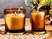 Load image into Gallery viewer, These classic Daniel Brighton scented candles make a beautiful add on gift. They are 250g = 40 hours burning time. Amber with gold lid, scents listed below. Sutherland Shire delivery. Sydney wide delivery. Australia wide delivery.
