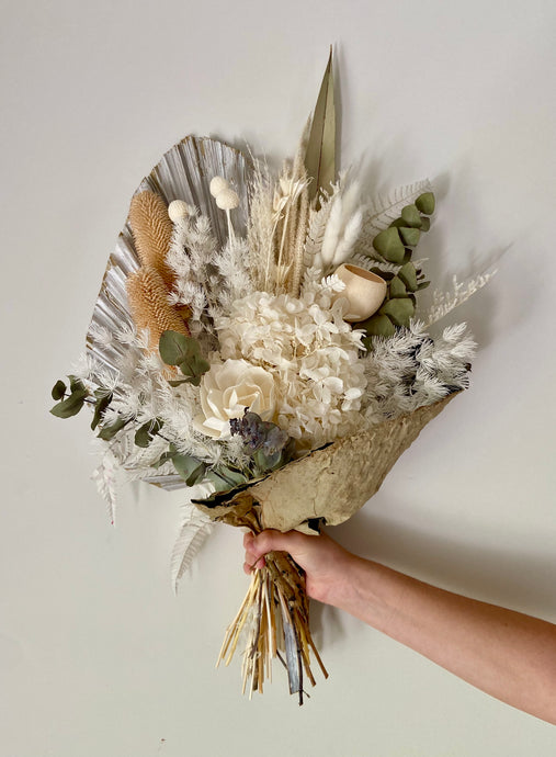 Natural Lotus Wrap is created using dried, preserved and faux flowers. This bouquet comes gift wrapped with a ribbon and can be displayed laid down or popped into a vase. Approx length is 60cm including stems. Sutherland Shire Delivery. Sydney Delivery. Australia Wide Delivery.