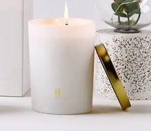 Load image into Gallery viewer, These classic Daniel Brighton scented candles make a beautiful add on gift. They are 250g = 40 hours burning time. White with gold lid, scents listed below. Sutherland Shire delivery. Sydney wide delivery. Australia wide delivery.
