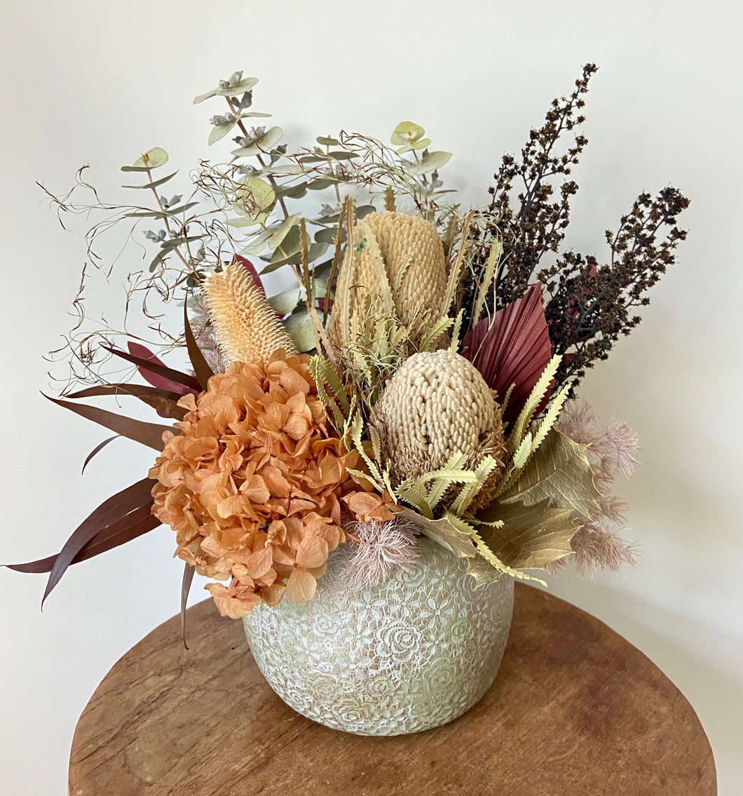 Outback Cappuccino is created using dried, preserved and faux flowers and comes displayed in a patterned concrete pot. This beauty can be displayed anywhere and would add a lovely simplistic charm. Approx size is 40cm x 30cm including the pot. Sutherland Shire delivery. Sydney wide delivery. Australia wide delivery.