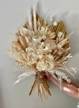 Load image into Gallery viewer, Pearl bouquet is created using dried, preserved and faux flowers. This beauty is great for any occasion and looks amazing in a vase in both the home or office. It can also be displayed laid along a sideboard, front reception table etc. Approx length is 60cm including stems. Sutherland Shire delivery. Sydney wide delivery. Australia wide delivery.
