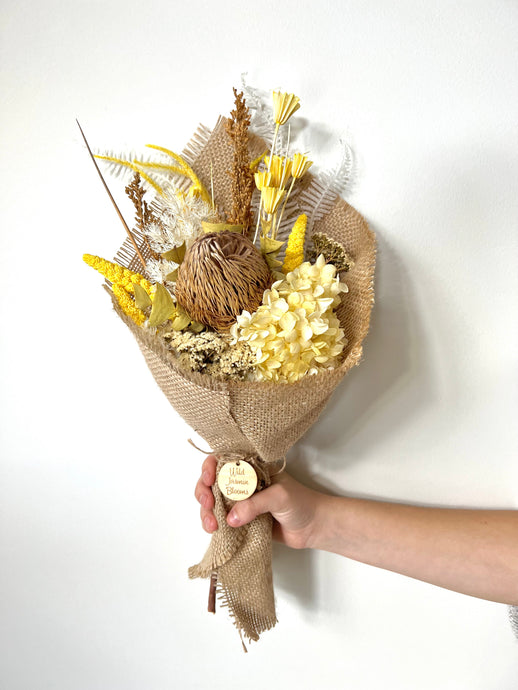 Lemon Meringue Posy is created using dried, preserved and faux flowers. This posy comes gift wrapped and can be displayed laid down or popped into a small vase. Approx length is 40cm including stems. Sutherland Shire Delivery. Sydney Delivery. Australia wide delivery.